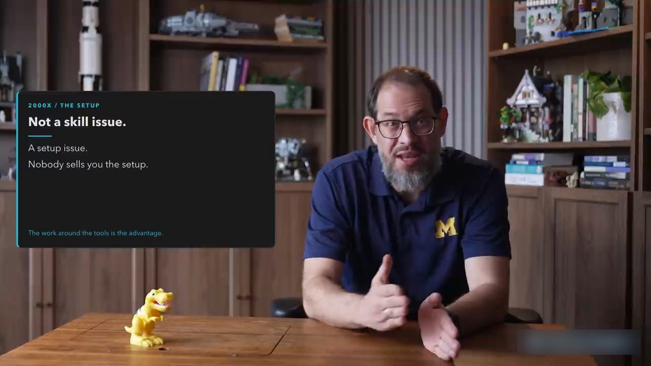 Nate B Jones ngồi bên bàn, cạnh tấm thẻ Not a skill issue