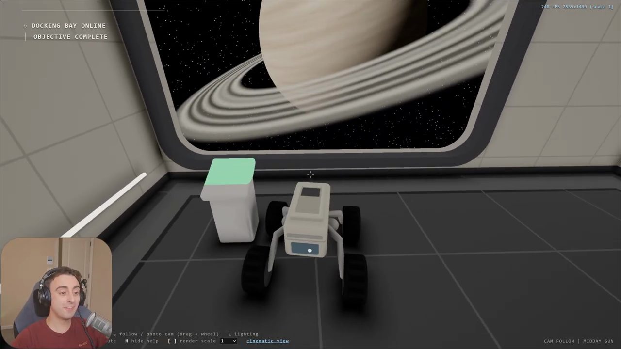 Rover trong phòng, cửa sổ lớn mở ra sao Thổ, HUD ghi Docking Bay Online, Objective Complete