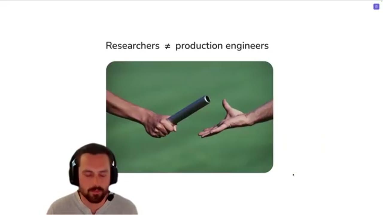 Slide Researchers khác production engineers, ảnh hai bàn tay trao gậy tiếp sức