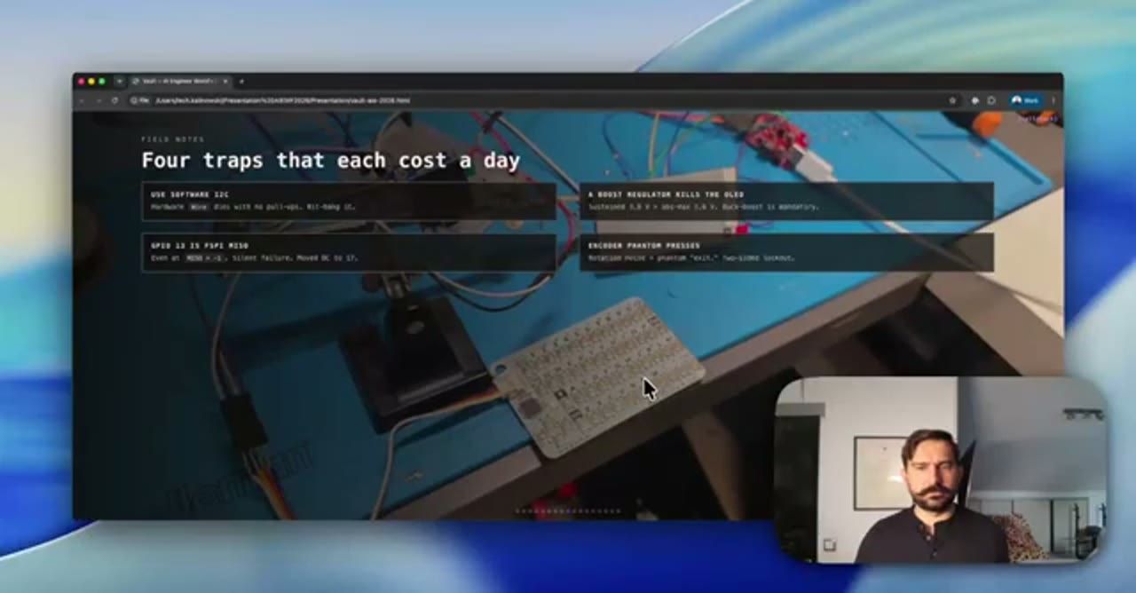 Slide Field notes: Four traps that each cost a day, nền là ảnh bàn làm việc với breadboard