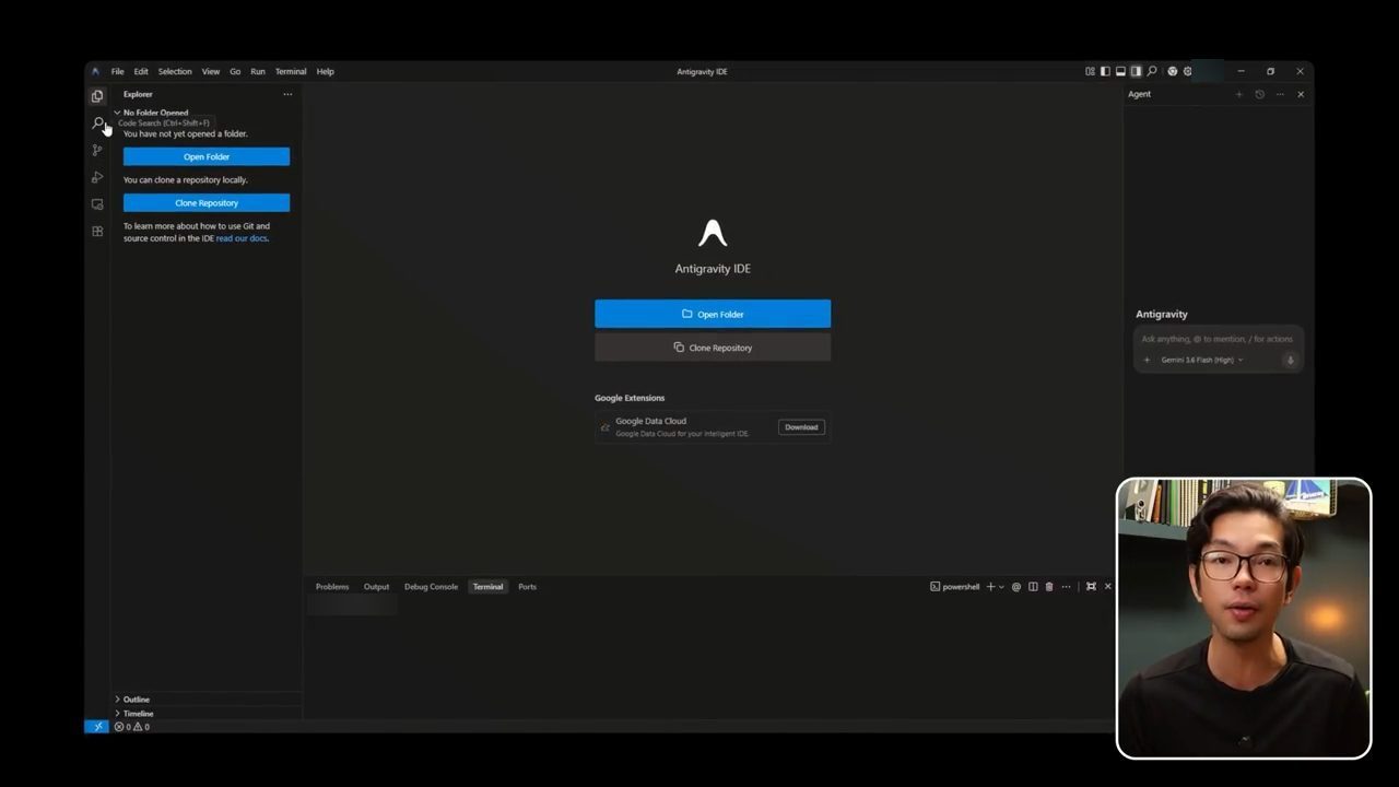 Antigravity IDE lúc chưa mở thư mục: explorer bên trái, nút Open Folder ở giữa, terminal phía dưới, panel Agent bên phải