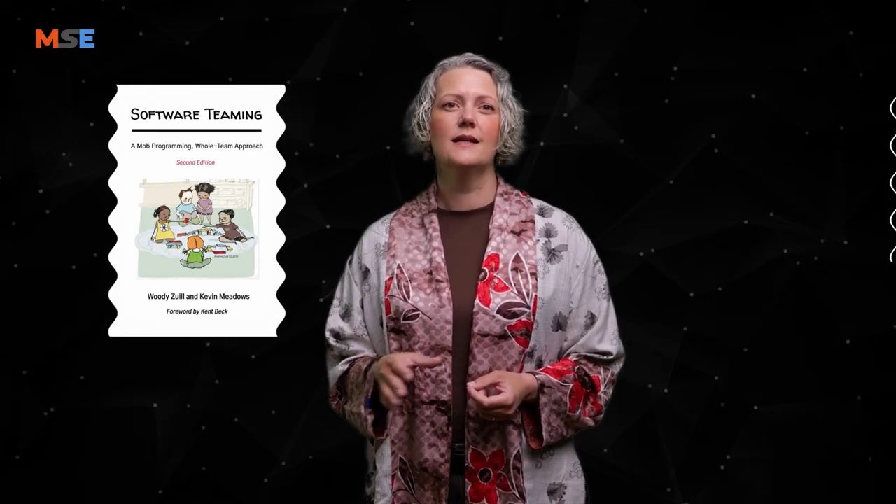 Bìa sách Software Teaming bên cạnh Emily Bache